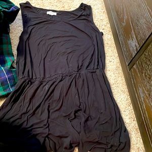 A black tank top romper which is from Maurice’s and it is a size Medium.